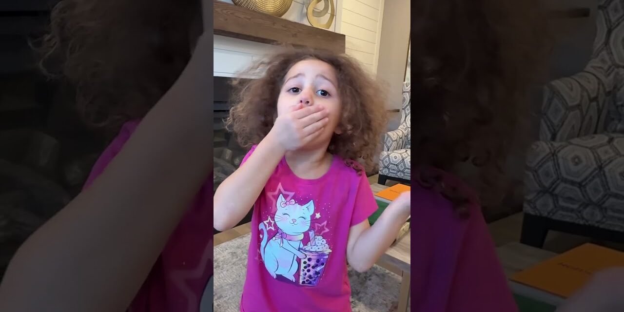 Sierra teaches Rhia healthy habits-eating fruits and veggies makes you strong and healthy