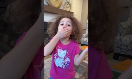 Sierra teaches Rhia healthy habits-eating fruits and veggies makes you strong and healthy